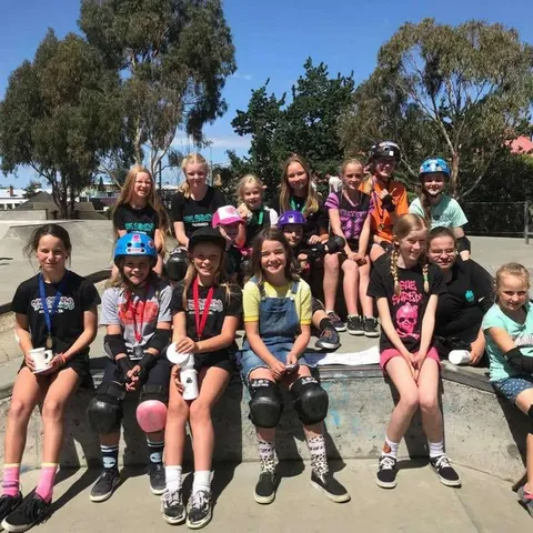 Big group of skaters at an outdoor skatepark